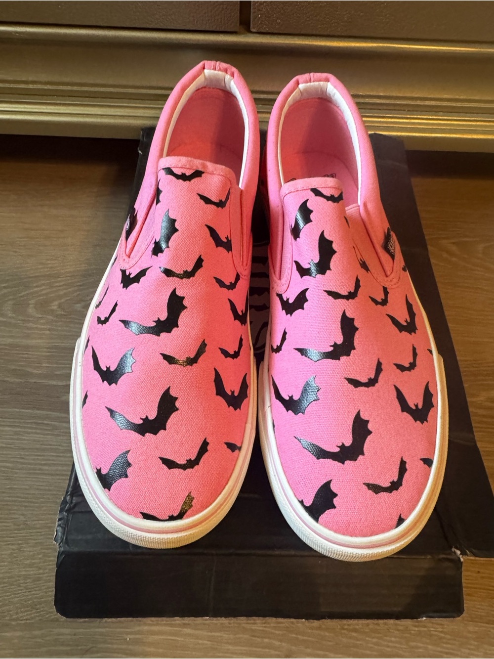 Pink Slip-On Sneakers with Black Bat Print